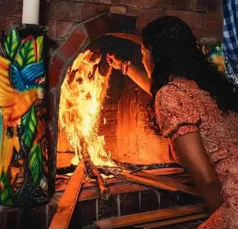 Lead female facilitator Jenna tending to the fire in the ceremony