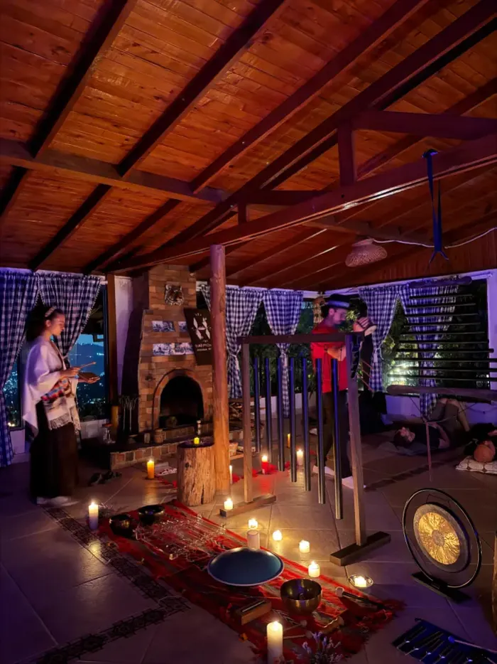 The ceremony room set with candles and a gong for the evening