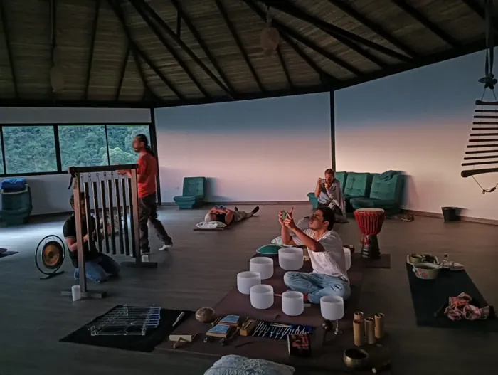 Sound healing in the maloka with crystal bowls, chimes and a drum